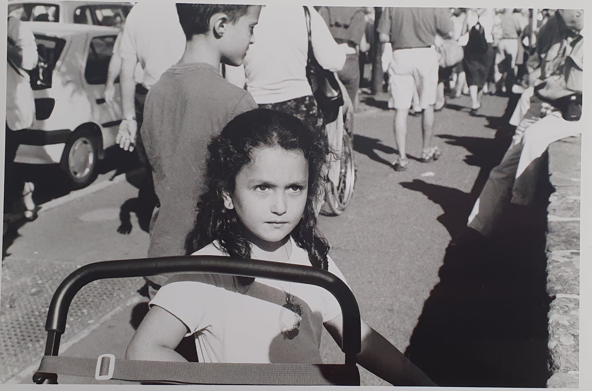 little girl, brown eyes, brown curly hair